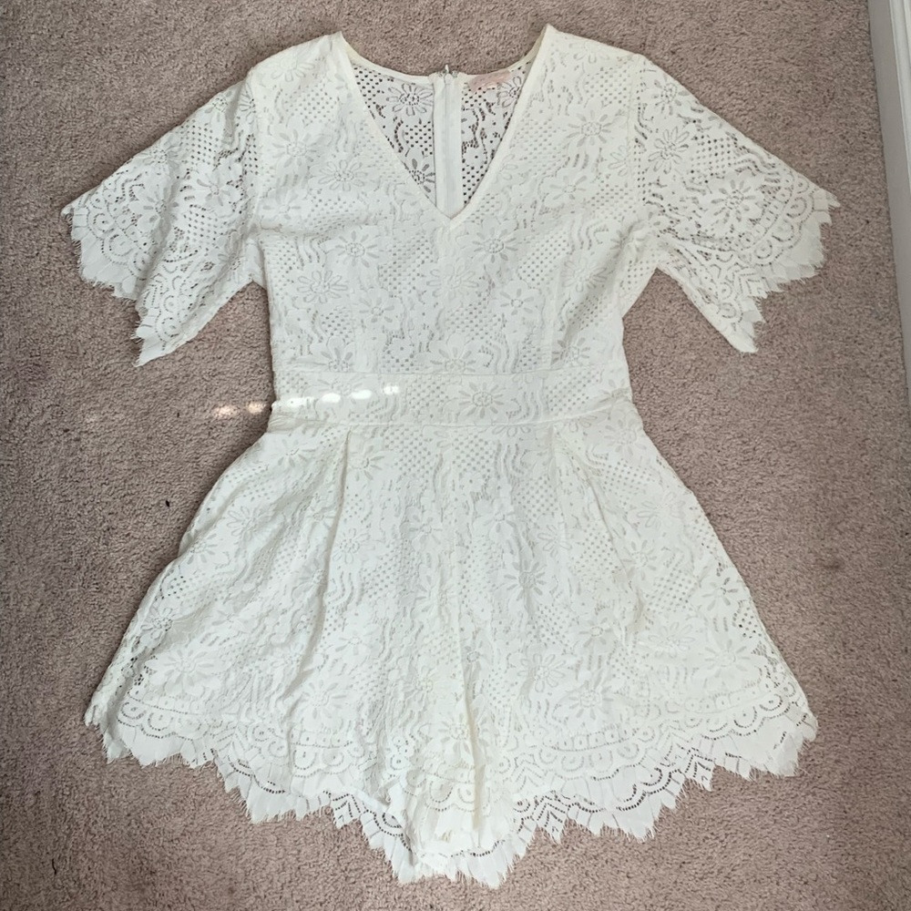 White lace romper. Back is lace with no inner lining.